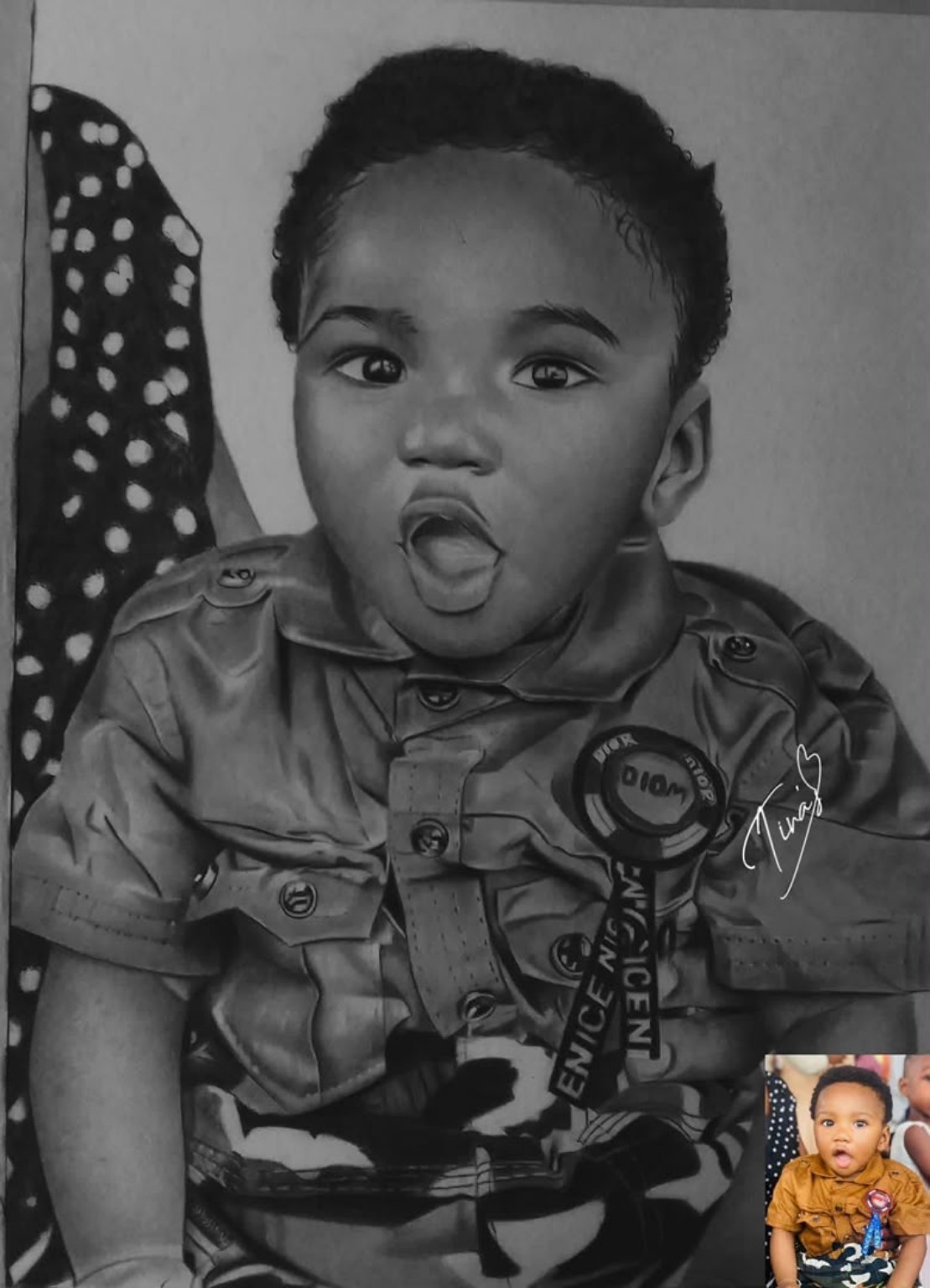 Detailed drawing of a young child, signed by Tina’s Arts II, with a small reference photograph
